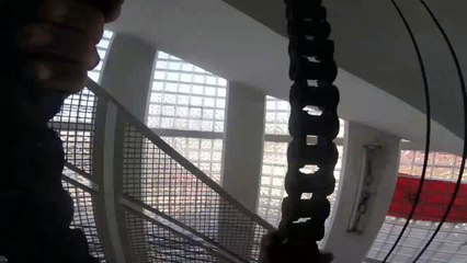 Athlete Parkours Out of Abandoned Building