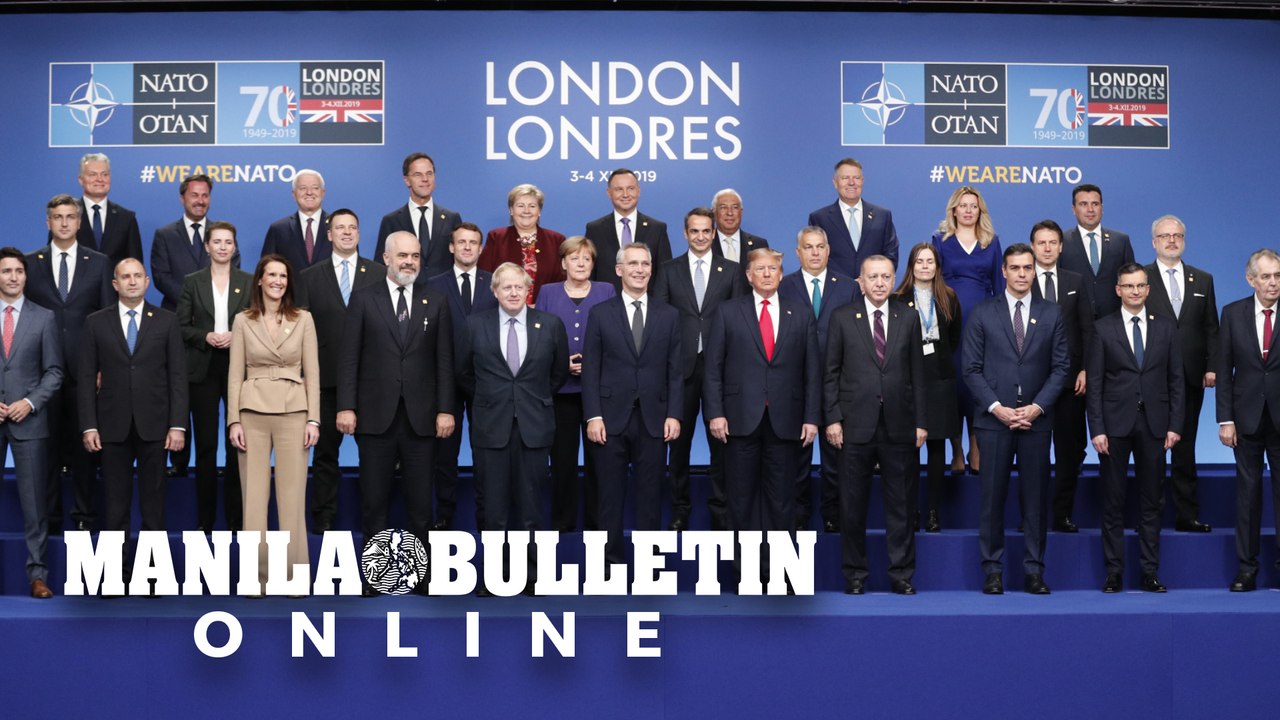 NATO leaders pose for family photo at 70th summit