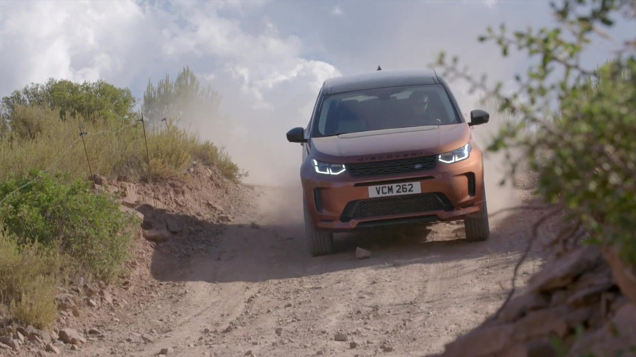 New Land Rover Discovery Sport in Namib Orange Off-Road Driving