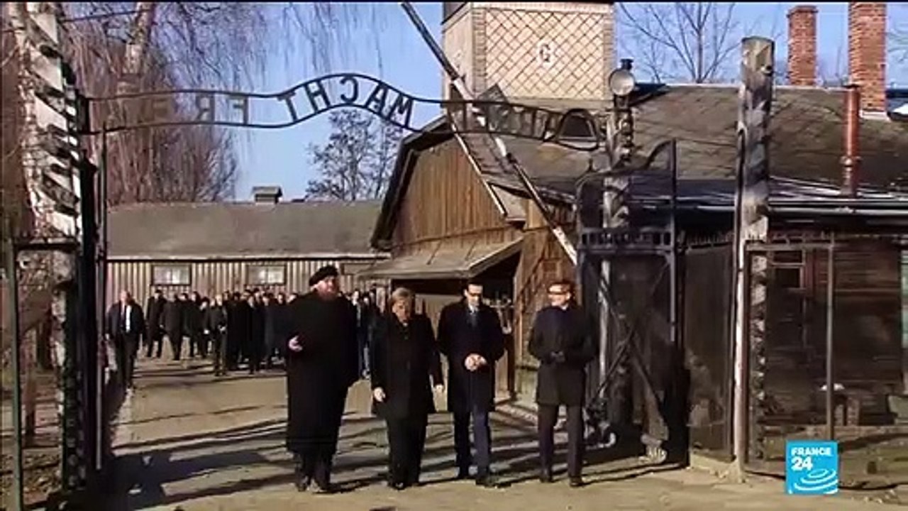 Germany's Merkel visits Auschwitz for first time as chancellor