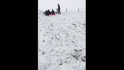 Kids Jump Ramp With Their Sleds And Fail
