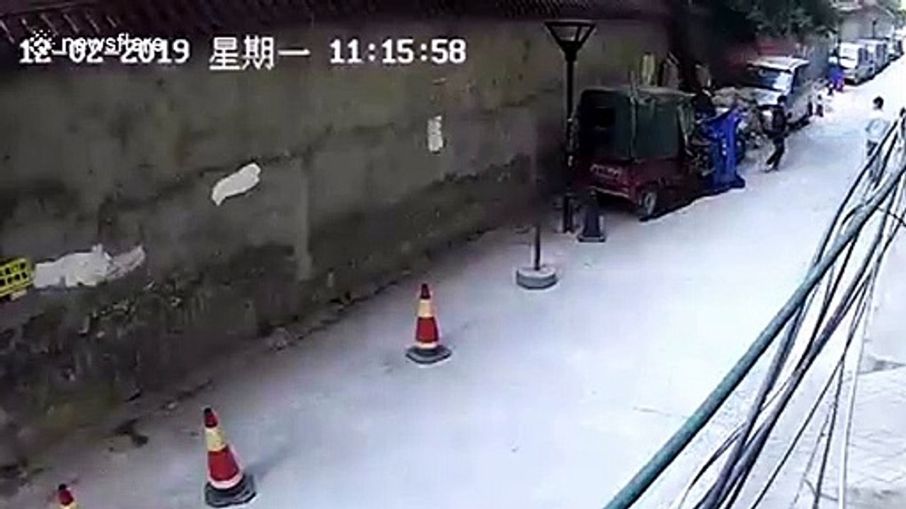 Three-wheeler bursts into flames after children light petrol that leaked on ground