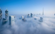 El skyline de Dubai visto por encima de las nubes