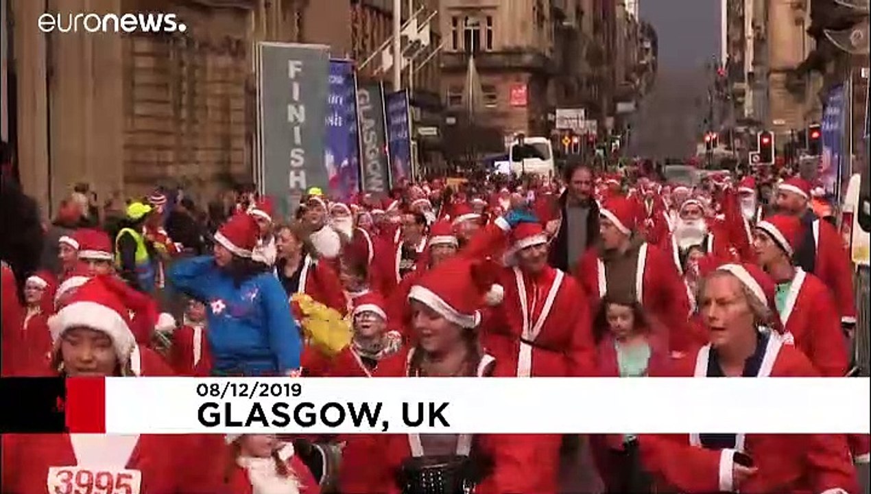 Glasgow's streets filled with Santas for annual charity run