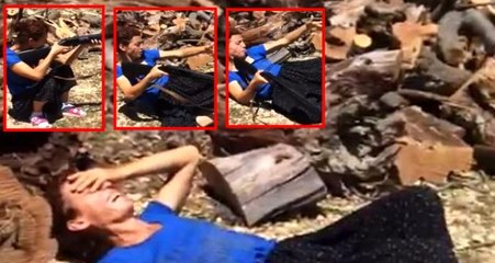 Hayatında ilk kez tüfek kullanan kadının tüfeğin tepmesiyle yere düşmesi izleyenleri güldürüyor