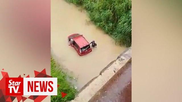 Doctor escapes death after car plunges into river