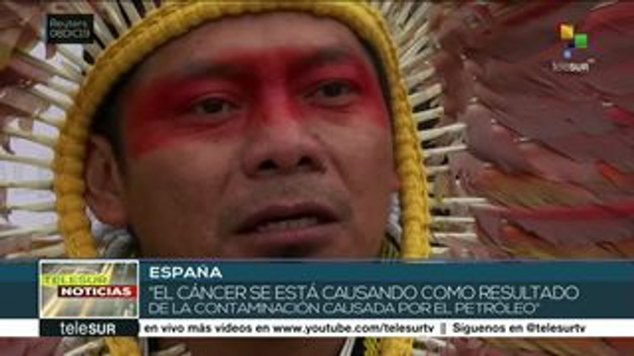 Protesta movimiento 350.org frente a oficinas de Repsol en España