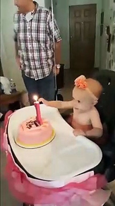 Baby Puts Hand In Fire On Her Birthday Cake