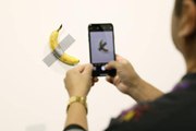 Man Eats $120,000 Duct-Taped Banana Art