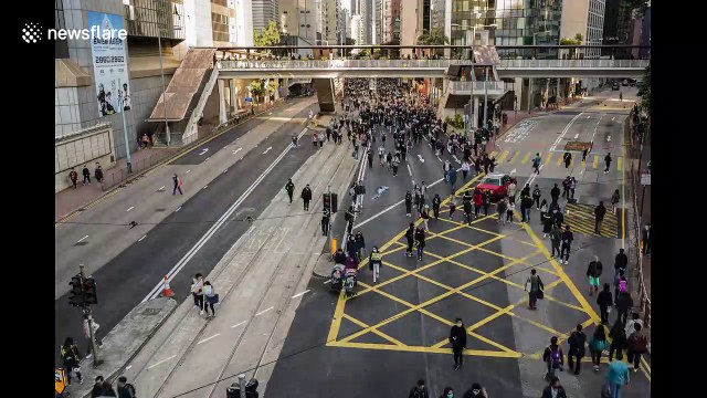 Timelapse footage captures thousands of Hongkongers marching to mark 6 months of protests