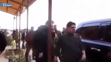 شاهد شبيحة تاجر أسد "حسام قاطرجي" وهم يؤدون التحية العسكرية له