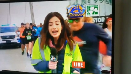 La reacción de una reportera que recibió un azote en directo durante una carrera popular