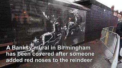 Banksy reindeer mural covered after red noses added