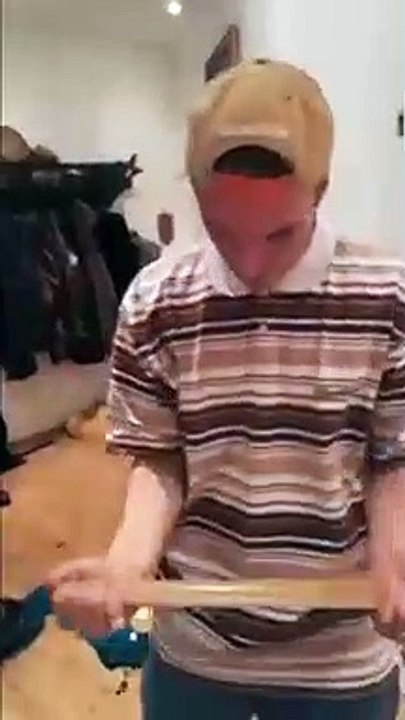 Guy Tries To Break A Piece Of Wood With His Head And Fails