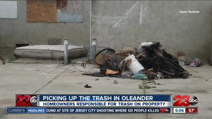 picking up the trash in Oleander
