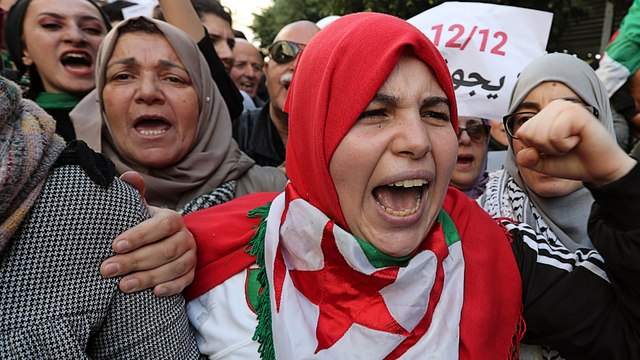 Algeria presses ahead with election amid protests