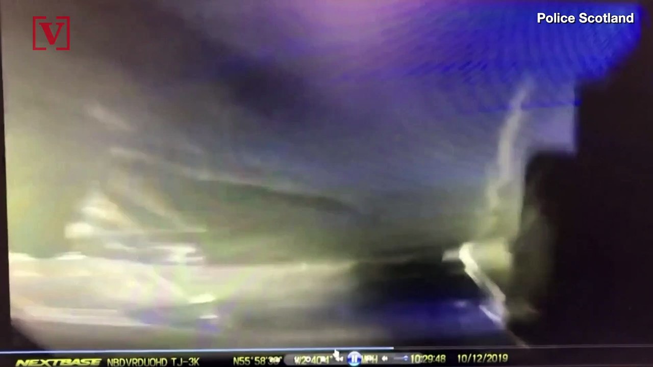 MUST SEE: High Winds In Scotland Causes Truck To Topple Over Onto a Police Car