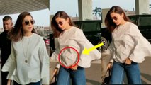 OMG!! Anushka Sharma HIDING HER BABY BUMP In Front Of Media At Airport