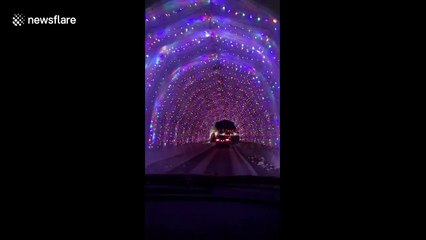 US tunnel decorated with lights is a festive treat for motorists