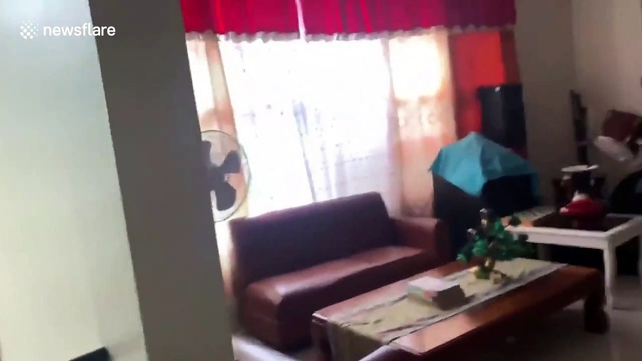 Terrified family runs from their home as earthquake hits Philippines