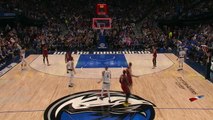 Kristaps Porzingis beats the buzzer from the logo