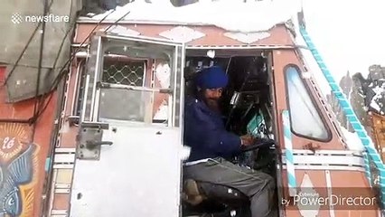 Heavy snowfall forces closure of national highway and suspension of air travel in north India