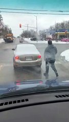 Guy Cleans Off Someone Else's Car Window