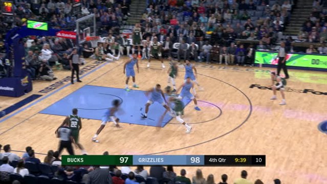 Giannis rocks the rim over defender