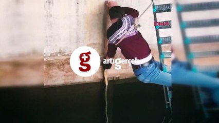 Yavru kediyi suya düşmekten son anda kurtardı