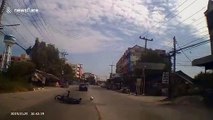 Thai motorcycle rider crashes into truck while seemingly using his phone