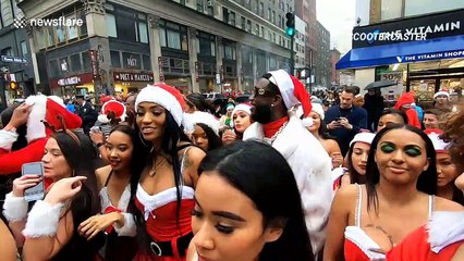 Rapper Gucci Mane among the Santa Clauses at this year's NYC Santacon