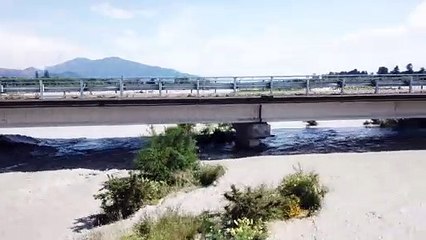 Flooded River Rises To Bridge's Roadway