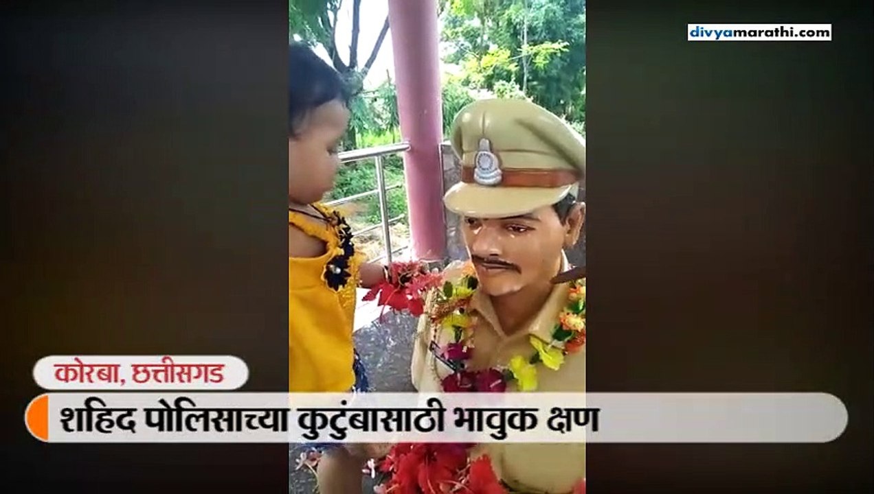 the little girl pampered the statue of the martyr's father