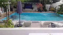 Further footage of hotel swimming pool shaking during powerful 6.8-magnitude earthquake in the Philippines