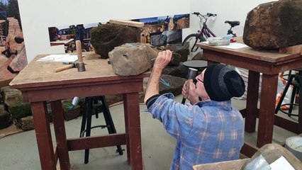 Peter Maris demonstrating stone carving at Dalby Forest workshop