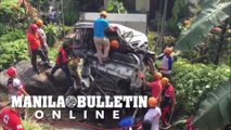 Rescuers retrieve the lifeless body of the truck driver involve in an accident  along Cardona, Rizal