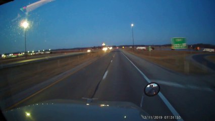 Squad Car Sent Spinning After Merging into Truck