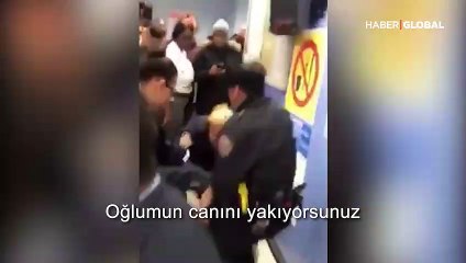 Polis kucağında çocuğu ile sürüklemişti, tazminat kazandı