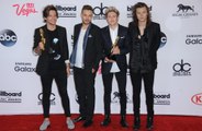 Louis Tomlinson 'doesn't always see eye to eye' with 1D bandmates