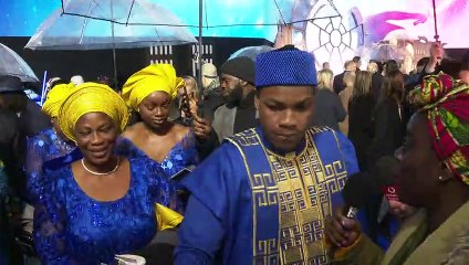 John Boyega brings WHOLE family to Star Wars premiere!