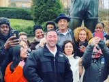 Sylvester Stallone with fans near the ROCKY statue in Philadelphia