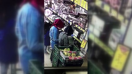 Manisa'da kadın şüphelinin, çocuklarının yanında yaptığı hırsızlık kamerada