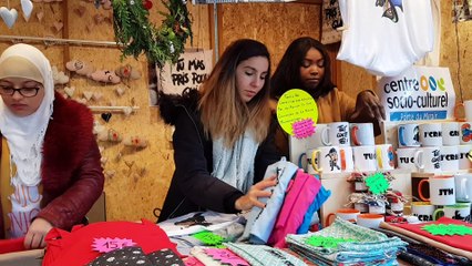 Au marché de noël avec Jamila Blibli, responsable pole jeunesse du csc Porte du Miroir.