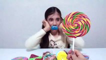 Learn Colors with M&M Candy Lollipops JOHNY JOHNY YES PAPA Nursery Rhymes أطفال مضحك ضد شبح - جوني جوني أغاني الحضانة قافية وتعلم الألوان للأطفال