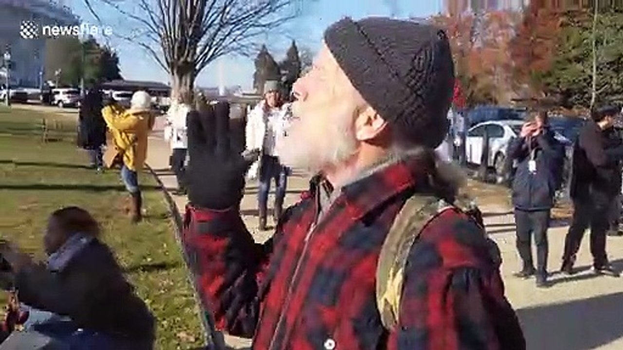 Trump supporters argue back during pro-impeachment rally at US Capitol