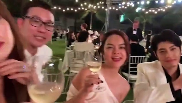 gil và hoàng thuỳ linh ngồi cạnh đám cưới