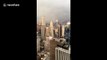US man films timelapse of snow squall engulfing New York City from towering office block