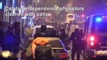Police clash with Catalan protesters outside Camp Nou stadium during Clasico
