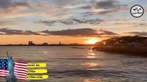 منظر غروب الشمس بين ناطحات السحاب في نيويورك