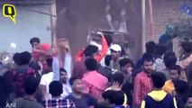 CAA Protests: Cops Take Cover After Stones Pelted in Ahmedabad